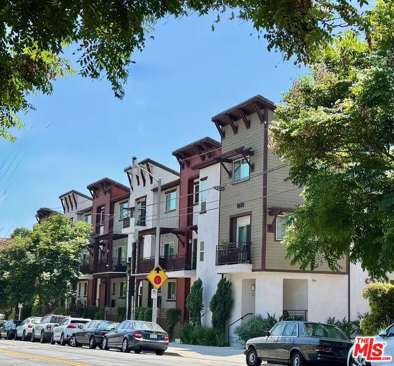 Fabulous 3-level townhouse in trendy Echo Park. Tucked in the back of this stylish Craftsman style complex built in 2012, right between Valerie and Canyon Coffee and just steps away from Elysian Park, and so many wonderful dining and recreational options. Enter the home directly from the lush garden path, or from your private 2 car garage which includes ample storage space. Come upstairs to a bright main living and dining space, featuring wood look flooring, recessed lights and a lovely balcony, which overlooks the garden. The modern kitchen has quartz countertops, stainless steel appliances and plenty of cabinet space. The main level also includes a powder room and laundry area. On the top level you'll find a primary suite with a generous walk-in closet and an elegant bathroom, plus an additional bedroom and full bathroom. Since it is a corner unit, there are windows on two sides and lots of natural light and green views from every room.