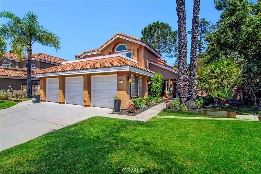 Nestled on a quiet cul-de-sac, this stunning Wood Ranch “Regalia” residence offers soaring ceilings, abundant natural light, and a spacious yet private backyard retreat. Relax by the serene Pebble Tec pool and spa while enjoying the diverse wildlife that call the hillside trees and shrubs home.



Inside, you’ll find a rare main-floor multi-purpose bonus room with vaulted ceilings, a wall of built-in cabinetry, a bar sink, and two sets of double doors opening to both the formal dining room and the pool area—perfect as a home office, artist studio, gym, guest suite, or cabana bar.



The upgraded kitchen features slab granite countertops, stainless steel appliances (including refrigerator and a back-saving double-drawer dishwasher), breakfast bar, and an oversized walk-in pantry. The downstairs bedroom—currently used as an office—offers soundproofed walls, double French doors, beautiful Acacia wood floors, and built-ins. A full shower bath is conveniently located nearby, along with a laundry room (washer and dryer included).



Upstairs, rich Acacia wood floors flow through the hallway and primary suite, with newer carpet in the secondary bedrooms. The primary suite features a walk-in closet, water closet, double-sink vanity, and new decking off its expansive balcony. A second balcony is shared by one of the secondary bedrooms. Both upstairs baths feature newer wood-look tile, and a whole-house fan with timer adds comfort and efficiency.



This home also includes solar, providing significant energy savings year-round, along with a large poolside cabana perfect for entertaining. Move-in ready with neutral paint, plantation shutters, and most windows replaced—this is a rare combination of style, comfort, and resort-style living in Wood Ranch.