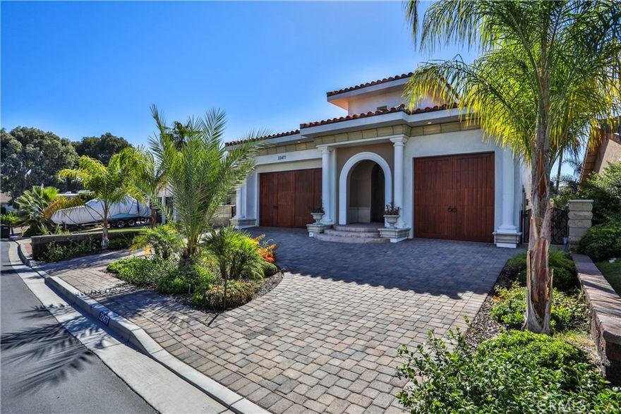 Stunning Brand-New Waterfront Estate in Canyon Lake! Welcome to the most luxurious new construction waterfront home currently on the market in Canyon Lake—where no expense has been spared and every detail has been meticulously crafted for upscale lakefront living. This custom-built masterpiece is nestled in a peaceful cul-de-sac on a quiet cove with direct access to the main lake. Inside, you’ll find soaring ceilings accented by rich wood beams and expansive windows that blur the line between indoor and outdoor living. The open-concept design is anchored by a chef’s kitchen featuring high-end appliances, a massive center island, and sleek finishes, flowing seamlessly into a spacious family room with breathtaking panoramic lake views. The private primary suite is your personal retreat, complete with a spa-inspired bathroom offering a jetted soaking tub, oversized rain shower, dual vanities, and a custom walk-in closet. Each guest bedroom boasts its own ensuite bath and walk-in closet, providing luxurious comfort for family and friends. This exceptional home also includes a private elevator, fully owned solar system, indoor laundry room, and a spacious 3-car garage. Step outside to your brand-new private dock with a boat lift—perfect for enjoying all the lake has to offer. Located just minutes from Canyon Lake’s best amenities—including the Lighthouse Restaurant, community pool, tennis and pickleball courts, golf course, equestrian center, baseball fields, waterfront campground, and scenic parks—all accessible via golf cart-friendly roads. Whether you're into wakeboarding, water skiing, paddleboarding, fishing, or simply soaking in the sunsets, this is your opportunity to own a rare piece of waterfront paradise. Live the lakefront lifestyle you’ve always dreamed of—schedule your private tour today!