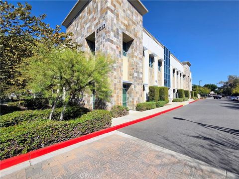 Photo of 19112 Gridley Rd Rd #214, Cerritos, CA 90703 (MLS # PW25280158)