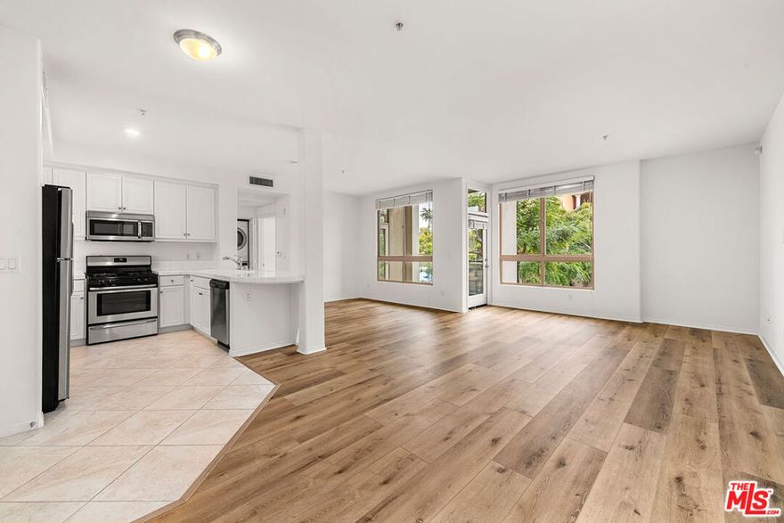 Beautifully updated 1BD/1BA condo in the heart of Playa Vista with no shared walls! Freshly painted with new wood-plank vinyl flooring. Open floor plan with spacious living area and large patio overlooking Concert Park. Bedroom features a walk-in closet; bath with dual sinks. In-unit laundry and 2-car tandem parking. Enjoy Resort & CenterPointe Club amenities, pools, gyms, cable, internet, and more. Short distance to Runway shops, Whole Foods, restaurants, and theaters. Move-in ready Silicon Beach gem!