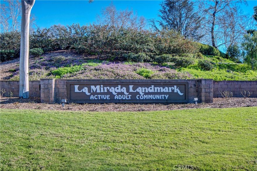I am pleased to present a  NO STAIRS IN UNIT - GROUND-LEVEL home opportunity within the LANDMARK 55+ Senior Community in La Mirada.

This unit has a BRIGHT AND AIRY SUNROOM, a Spacious Living Room, Dining Area, Two Bedrooms, including a MASTER SUITE, and two bathrooms.  Both bedrooms include mirrored closet doors.  The Kitchen is equipped with beautiful wood cabinets.   There is a stackable washer and dryer conveniently located in the SUN ROOM.

The prestigious Landmark community offers 24/7 GUARDED SECURITY, with a wealth of amenities including PICKLEBALL COURT, swimming pool, spa, tennis courts, PUTTING GREEN, FITNESS CENTER, library, WALKING TRAILS, and a CLUBHOUSE.  The community hosts FUN MONTHLY SOCIAL EVENTS and boasts lush BEAUTIFUL LANDSCAPED GROUNDS.

The location is ideal, situated near the La Mirada Performing Arts Center, La Mirada Golf Course, shopping and restaurants.

Are you ready to enjoy a vibrant, Active Lifestyle  at the LANDMARK LA MIRADA?