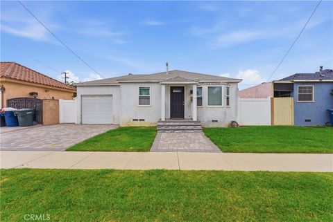 Photo of 16407 Santa Ana Avenue, Bellflower, CA 90706 (MLS # DW26072015)