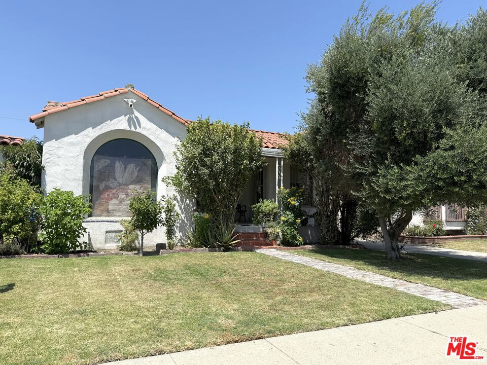 Charming 3-Bedroom, 2-Bath Updated Spanish Bungalow in Hyde Park. Step into this beautifully restored Spanish-style home that blends timeless elegance with modern comfort. Featuring original architectural details such as coved ceilings and arched doorways, this classic California bungalow has been lovingly brought back to life.Located in the vibrant and growing Hyde Park neighborhood, you're just minutes from SoFi Stadium, the Kia Forum, and the newly expanded LAX putting the best of LA right at your doorstep.Inside, you'll find: Three spacious bedrooms Two stylishly updated bathrooms A gorgeous kitchen with contemporary finishes A separate dining room and cozy breakfast nook Ample closet space and storage A large backyard with mature fruit trees perfect for entertaining or relaxing outdoorsWith architectural charm that evokes Old Hollywood glamour and a location on the rise, this home is the one to beat.