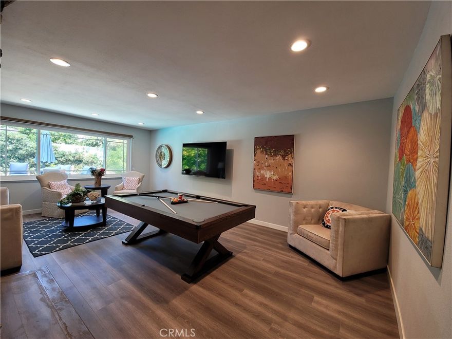 Elegant Single-Story Pool Home in Portola Park! Welcome this beautifully maintained single-story residence nestled in the tranquil Portola Park neighborhood of Santa Ana. This 5-bedroom, 2-bathroom home spans 2,145 square feet and sits on a 7,242-square-foot lot, offering a perfect blend of comfort and style.

Key Features:

Spacious Living: Enjoy a bright and open floor plan with large rooms and ample closet space.

Modern Amenities: The home features newer windows, plantation shutters, and dual fireplaces, creating a cozy and energy-efficient environment.

Gourmet Kitchen: A newly remodeled and well-appointed kitchen ideal for culinary enthusiasts. Big island opens to dining room is perfect for gathering!

Outdoor Oasis: Step outside to a private backyard retreat complete with a sparkling pool and spa, lush hibiscus plants, a lime tree, and a new aluma wood fence.

Prime Location: Situated within the award-winning Tustin Unified School District with the top score high school and offering easy access to the 22 and 5 Freeways, as well as nearby shopping and dining options. 

This home is perfect for those seeking a comfortable and stylish living space in a desirable neighborhood. Don't miss the opportunity to make this exceptional property your new home.