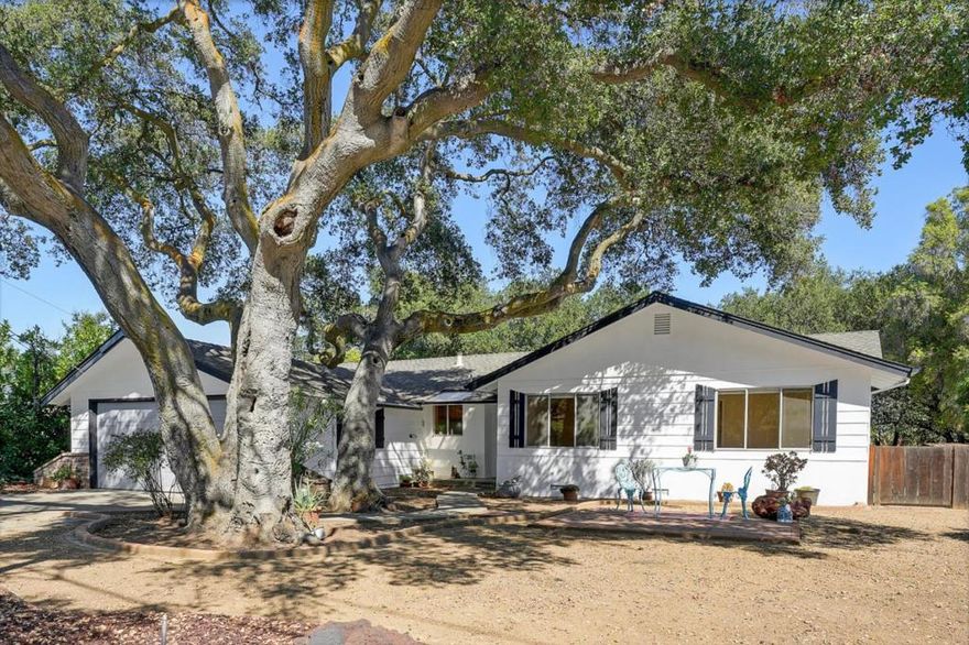 Very rare opportunity in Cupertino's coveted Monta Vista neighborhood with an expansive 1/4 acre lot served by top-rated Cupertino schools. Enjoy brand new gleaming engineered hardwood flooring throughout (high quality water resistant SPC) as well as all new exterior paint! This home's very efficient floor plan provides seamless indoor-outdoor living and effortless entertaining. The sprawling private backyard (with no homes directly behind) is framed by a breathtaking vista of heritage oak canopies beyond the very long rear fence, creating a serene and picturesque retreat. Many modern improvements amongst the timeless vintage charm of original features in unbelievably great condition throughout the bright and functional layout. Sunlight pours through the living room's large skylight accentuating the gorgeous wood framed original brick fireplace. The updated galley kitchen features abundant oak cabinetry and flows directly into a spacious dining/family great room. An adjacent sun room beckons you toward the meticulously landscaped backyard, a verdant oasis for relaxation and entertaining. Ideally located near top schools, vibrant shopping and popular restaurants, with easy access to Highways 85 and 280, this home offers effortless commuting to the entire Bay Area and beyond.