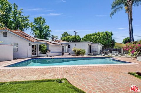 Photo of 5195 Densmore Avenue, Los Angeles, CA 91436 (MLS # 26861963)