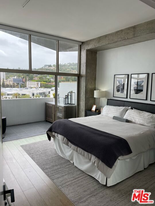 Penthouse Perfection with Unmatched Jetliner Views! Introducing a rare opportunity to lease a dramatic, designer-done penthouse in one of Los Angeles' most prestigious full-service buildings. Perched high above the city with panoramic, unobstructed views from every room, this stunning corner residence is the ultimate in elevated luxury living.Sleek, sexy, and saturated in natural light, the modern open-concept floor plan is framed by soaring ceilings and walls of floor-to-ceiling glassblurring the lines between indoor elegance and outdoor serenity. Step out onto an expansive private balcony that spans the entire length of the unitperfect for morning coffee at sunrise or cocktails under the city lights.This architectural showpiece boasts rich hardwood flooring, a wood-burning fireplace, and a layout designed to impress. The primary suite features awe-inspiring vistas and a sense of tranquility rarely found in urban living.Residents enjoy white-glove amenities including 24-hour doorman and security, valet parking, a heated pool, spa, sauna, state-of-the-art fitness center, recreation room, private dog park, and additional storage.Moments from Equinox, Sunset Plaza, premier dining, shopping, and world-class nightlife, this location is second to none.Available furnished or unfurnished. Security deposit to be determined based on applicant's credit and lease terms.Private showings by appointment only. FOR SHOWING REQUEST TEXT LISTING AGENT.