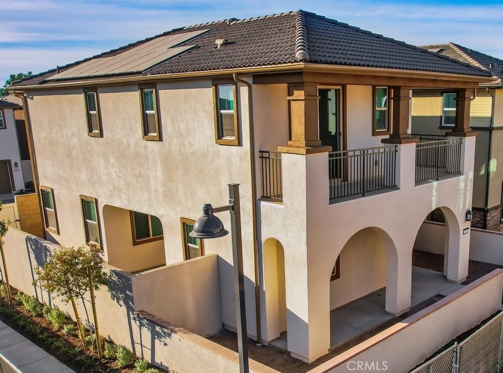 RARE — a beautifully upgraded corner-lot home with one of the few private driveways in the community.
This thoughtfully designed residence offers the perfect balance of space and style, ideal for both daily living and entertaining. The open-concept layout seamlessly connects the living, dining, and kitchen areas, creating a warm and inviting atmosphere where everyone feels at home.
The chef-inspired kitchen features abundant cabinetry, a spacious walk-in pantry, and ample counter space for cooking and gathering. Just off the main living area, the California room offers a peaceful retreat — perfect for enjoying a morning coffee or relaxing in the evening breeze.
Tucked away on the first floor is a secondary bedroom with a full bath, providing a comfortable space for guests or multi-generational living.
Upstairs, the luxurious primary suite offers a spa-like shower and a large walk-in closet, creating a serene space to unwind. A versatile loft adds extra room for entertainment or family time, while two additional bedrooms, a full bath, and a convenient upstairs laundry room complete the second floor.
Bathed in natural light, this south-facing home feels bright and airy throughout the day, enhancing its cheerful ambiance. Thoughtfully upgraded throughout, this home offers both comfort and sophistication in a vibrant, connected community.
Situated within the award-winning Irvine School District and just a short walk from a brand-new shopping plaza opening in 2026, this home offers the ultimate in convenience, education, and lifestyle.