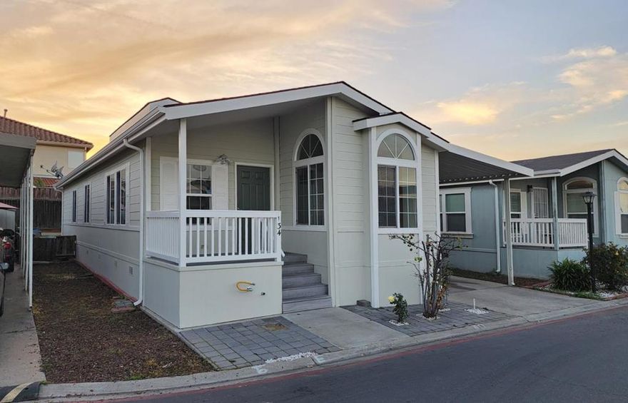 This gorgeous 2006 Silvercrest home is nestled in a friendly and quiet neighborhood area. The home has 3 bedrooms and 2 bathrooms with a spacious open floor living room and cathedral ceiling. The kitchen showcases a box bay window, beautiful cabinetry, breakfast bar, recess lights, stove, microwave, and refrigerator. Exterior and interior of home was recently painted like new. Other features include Pergo flooring in living room and all bedrooms, double pane windows throughout the house, Wi-Fi thermostat, heating and air condition, separate laundry room, and plenty of cabinets for storage space. Park amenities include a club house, swimming pool, guest parking, and friendly manager. Located in a desirable area for shopping and restaurants. Space rent is only $1,239. Ready to move in condition.