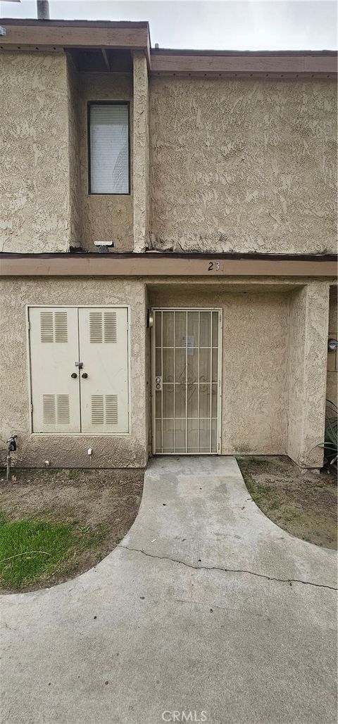 Photo of 936 Fairway Dr #23, Colton, CA 92324 (MLS # IV26015933)
