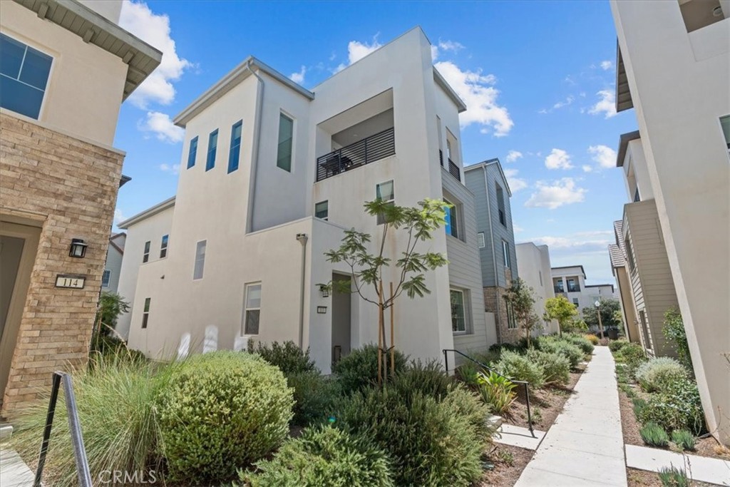 This stunning three-story residence combines style, comfort, and versatility in one of Irvine’s most desirable neighborhoods. The open-concept main level features a bright living area and a sleek kitchen with a large walk-in pantry, perfect for everyday living and entertaining. A first-floor bedroom with full bath offers flexibility for guests or multi-generational living.
Upstairs, the primary suite is a true retreat with a spa-inspired bath, soaking tub, dual sinks, and a walk-in closet. Two additional bedrooms, a full bath, and a laundry room complete this level. The third floor offers a spacious bonus room and a covered deck, ideal for a home theater, office, or game room. All while enjoying beautiful sunset views.
Just a few blocks from Cadence Park K–8 and part of the award-winning Irvine Unified School District, this home also includes resort-style amenities such as pools, playgrounds, and walking trails. Added value comes with paid-off solar panels and low HOA dues.
This is more than a home, it’s an Irvine lifestyle, ready to be yours.