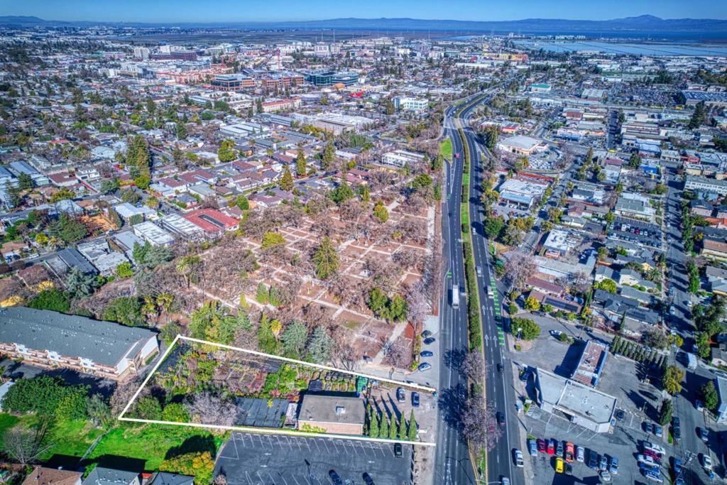 The Value Is The Land, Location & Development Opportunity. The parcel offers 32,583 sq. ft. Zoned for Mixed Use Neighborhood MUN. Redwood City Planning Department has suggested a 60 foot in height residential building, other commercial height limit is 35 feet in height. Other uses suggested are hotel, senior/.assisted living, as well as many other possibilities. Currently owned and operated family nursery for several decades. The existing two story is approximately 4,077 sq. ft. with residence on second floor and structure currently mixed-use. Buyer could continue nursery operation and enjoy healthy annual sales, and residential rental income from living unit on second floor while planning their proposed development with the Redwood City.