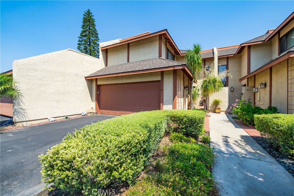 Move right into this 3-bedroom, 2.5-bathroom townhouse in the highly desirable Heritage Village community. This approximately 1,657 sq. ft. home features an attached two-car garage and is equipped with central heat and air for year-round comfort. The sale includes all major appliances: a refrigerator, washer, dryer, and stove.
Step outside to an oversized patio, perfect for entertaining or simply enjoying a quiet morning coffee.
Enjoy a low-maintenance lifestyle with the HOA covering water, trash, basic cable, and internet. Residents also benefit from a clubhouse, two community pools, a spa, and additional amenities. Located in the heart of La Habra, this property offers unbeatable value and convenience.