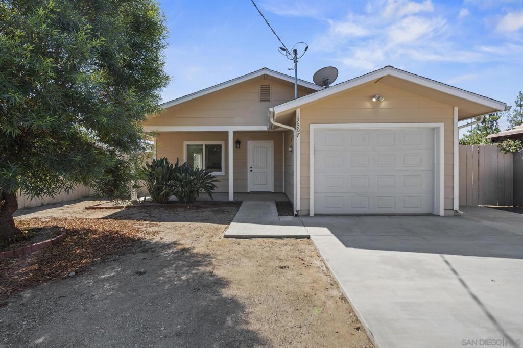 This house is it! You are not going to find a better combination of livability, construction, turnkey condition and location in this price point. First, it’s newer construction and only 11 years old! The floorplan is wide open and intelligently laid out. Step inside to a “great room” with a huge living and dining room combo, opening directly into a fully equipped kitchen. The open concept features a ton of light (including skylights) and direct access slider from the dining area out to the side yard. The kitchen, like both baths, features granite counter tops and a ton of cabinetry. It’s fully equipped with all appliances, including dishwasher and microwave. There is a full-size laundry room that has a large functional utility sink. An extra-deep garage of approximately 30 ft is accessed from the laundry room. There’s plenty of storage space for bikes, ATVs or other fun toys! Automatic garage door. The lot is perfectly set back and boasts a big backyard that can accommodate kids, dogs, hot tub or just good times! *See Supplement for Details* The home’s construction is rock solid, built on re-compacted soil under the entire house with class 2 base added for stable substrate to county specs! Solid concrete slab house foundation. There is an efficient central HVAC system and the whole house has a fire sprinkler system! The electrical has LED lighting throughout (both inside and outside). All electrical sockets are 20 amps and there is an easily accessible central phone and cable hub that connects to all those outlets in the house. You seldom see quality upgrades like this in this price segment! The bedrooms are spacious, and each feature ceiling fans. The master bedroom has a big walk-in closet and an en-suite bath with dual sinks, so no sharing required! You also have direct slider access to the backyard. Additionally, in the backyard and front, there is an automatic sprinkler system installed. The property is located on a dead-end 1 block long street - no thru traffic!! - for more privacy. Gate on driveway entrance. Street is extra wide. In addition to street parking in front, there's room for 6 or 7 cars on site.