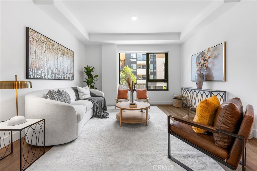MW Lofts Pasadena represents the pinnacle of modern urban living in one of Southern California’s most desirable locations. For sale for the first time, this brand new condominium project features 115 units. Unit 214 is a 3 bedroom, 2.5 bathroom floor plan with 1,324 SF of space. The kitchen opens into a great room with an abundance of sunlight. The primary bedroom is en-suite. The secondary bedrooms are share the second full bath. There is an oversized powder room and plenty of storage. Laundry is included and in-room.
This sophisticated condominium combines cutting-edge design with refined elegance, offering spacious, open-concept floor plans, high-end finishes, and panoramic views of the surrounding city and mountains. Each residence is carefully crafted with premium materials and expansive windows that flood the interiors with natural light. Residents of MW Lofts enjoy exclusive amenities, including controlled access, a state of the art fitness center, private rooftop lounge, and terrace, all in close proximity to Pasadena’s finest dining, shopping, and cultural landmarks
