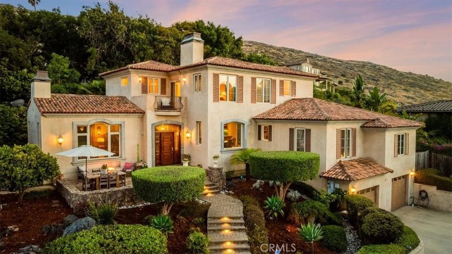 Tucked Away Tuscan Retreat in the Heart of San Luis Obispo.  At the end of a peaceful cul-de-sac shared by just one other home, this architecturally significant Tuscan-Mediterranean residence offers privacy, character, and incredible versatility. With over 2,700 square feet of living space on more than 1/3 of an acre, this stunning property is a true oasis in the heart of the city.



A hand-painted mural welcomes you into the dramatic formal living room, where soaring ceilings, hardwood floors, and a cozy fireplace set the tone for elegant yet comfortable living. Just a few steps up, the open-concept family room and dining area flow seamlessly into a spacious chef’s kitchen featuring granite countertops, two bar seating areas, wine storage, and a wine fridge—ideal for entertaining.



The top-floor primary suite is a private sanctuary with breathtaking views of Poly Mountain and the surrounding foothills. It includes an oversized walk-in closet and a luxurious en-suite bath with dual vanities, a two-person soaking tub, and a large walk-in shower.



Downstairs, two generously sized bedrooms offer private entrances and have been successfully used as short-term rentals, bringing in over $15,000 in Airbnb income last year. Additional highlights include a bonus media/den room, a spacious laundry room, and a 3-car garage with ample guest parking.



Experience timeless Mediterranean charm, flexible living spaces, and income-generating potential—all in one of San Luis Obispo’s most desirable hidden pockets.
