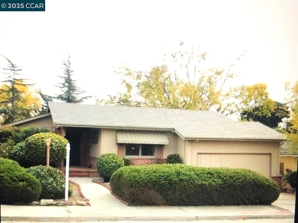 Walk to Lake Chabot from this great location! Property being sold "as is" in need of many upgrades and updates!! Make it your own! Three bedroom, two bathroom and two car garage. Location! Location! Location!!