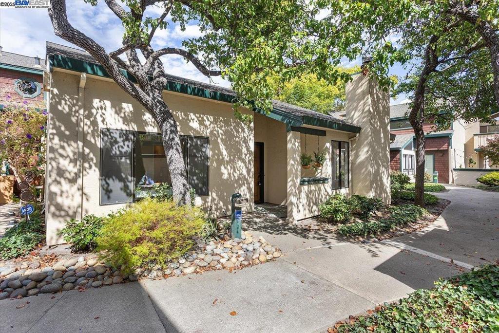Hard-to-find one-level townhouse in desirable Baywood Village. This 2-bedroom, 2-bath home features brand-new luxury vinyl plank flooring in the living and dining areas, new carpet in the bedrooms, and fresh interior paint throughout. The spacious living room boasts vaulted ceilings, track lighting, and a floor-to-ceiling fireplace with a gas starter. The updated kitchen is light and bright, with recessed lighting, stainless steel appliances that includes subzero refrigerator, overlooking both the dining area and private courtyard. The primary suite offers generous closet space with mirrored closet doors and a primary bath with dual sinks and a walk-in shower. Need extra space? Don’t miss the finished attic, perfect for storage or flex use. Additional highlights include a 2-car garage with new epoxy floors. Baywood Village is known for its peaceful pathways, mature trees, and lush landscaping along the lagoon. Amenities include community pool and spa. Close proximity to Harbor Bay Ferry, Oakland Airport, views of San Fransico Bay and skyline, shopping, beautifully maintained greenbelts, park that has tennis and pickle ball courts, award winning schools.