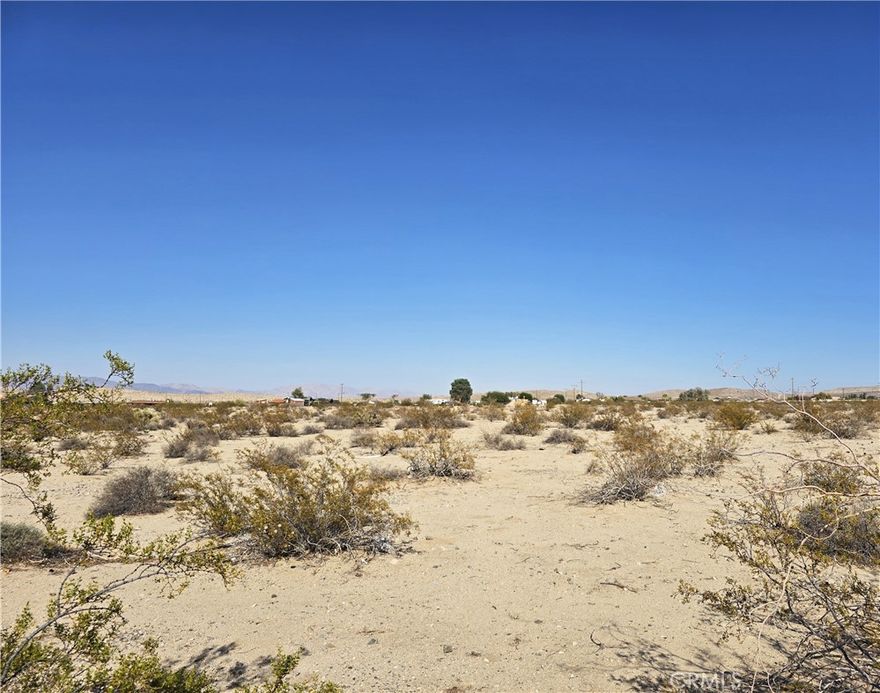 This .63-acre parcel offers peaceful seclusion and stunning views in every direction. With no county-maintained roads, but accessible via well-traveled desert trails, the property provides a true off-the-beaten-path experience. Enjoy wide-open desert landscapes and some of the area’s most iconic mountain views. A great opportunity for those seeking off-grid potential, weekend recreation, or long-term investment. Buyer to verify availability of​​‌​​​​‌​​‌‌​​‌​​​‌‌​​​‌​​‌‌​​​‌​‌​​​‌‌​ utilities.