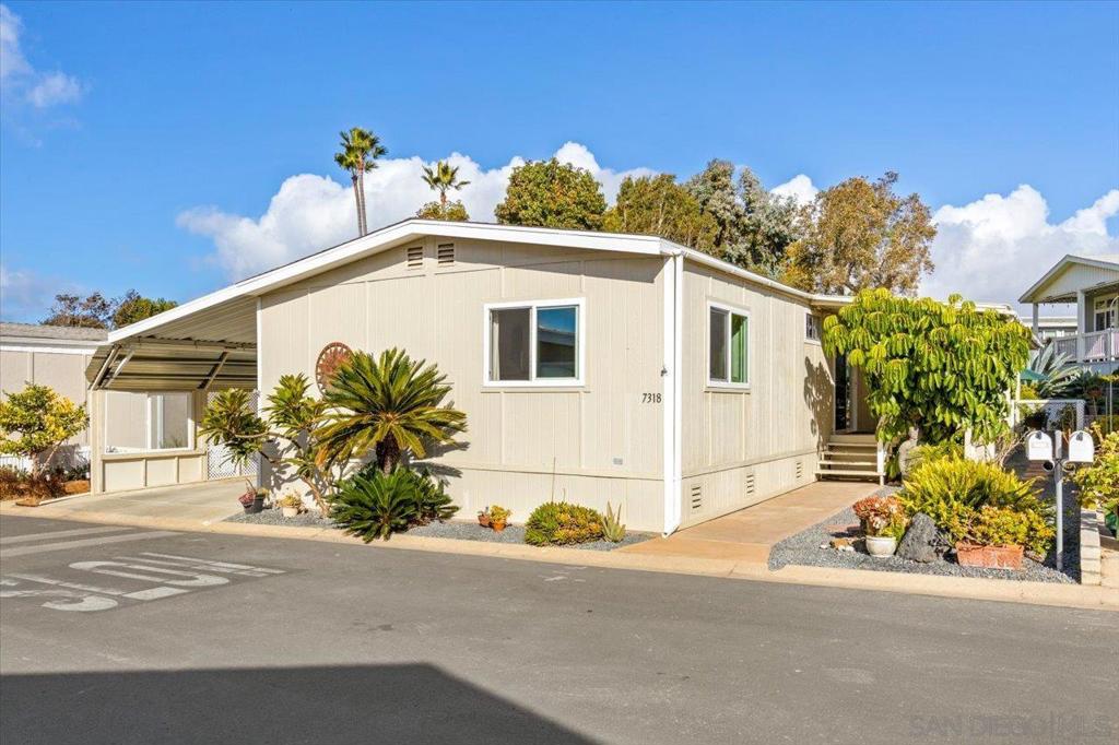 Priced To SELL NOW!! **NO REAL ESTATE TAXES** Welcome to Paradise!! This Super Cute 2 Bedroom/2 Full Bath light & bright home has been meticulously maintained! Upgrades include: Newer roof (3 years), newly remodeled primary shower, newer carpet (2/2024), new interior paint, newer vinyl dual pane windows and 240 volt EV charging station! Premium space backs up with views to the Greenbelt! Several large, beautifully landscaped entertaining areas outside for the Sunny California weather! Kitchen has a large walk in 3x4 pantry! Covered outside entertaining deck is 8x26 and the concrete outside pad is 13x14, perfect for al fresco dining. Lakeshore Gardens 55+ Luxury Senior Community is minutes away from South Carlsbad State Beach and not far from any amenity you could imagine. This community has many annual events throughout the year, some are: 4th of July celebration, Casino Night, Christmas/Holiday party, New Years Eve celebration, Bingo, Yoga, Aqua Aerobics, Tai Chi, Zumba, Poker, Dominoes, Line Dancing, Mahjong, Monthly Mixers & Breakfasts, Thanksgiving, Veterans recognitions and remembrance's and many other activities.