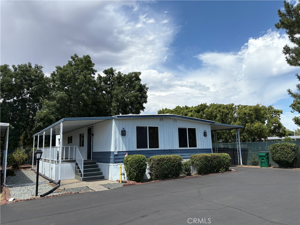 Best location in the park you will find this spacious and updated manufactured home with front covered deck 23 x 7 feet and back enclosed patio 16 x 9 feet, remodeled master bedroom and kitchen, central heat n air, pantry, indoor laundry, all appliances included. Swimming pool, clubhouse, patio with BBQ, commercial washer and dryer. community gatherings have monthly potluck dinners, card games, bingo games and holiday events. Located just a few minutes from Bidwell Park, golf course, Elks lodge, shopping, walking paths and fire station #5. Space rent includes water n trash service