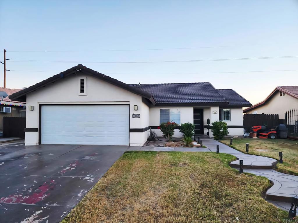 Welcome to 1268 JB Rodriguez, Calexico! This charming 3-bedroom, 2-bathroom home offers comfort, space, and extra income potential. Located in a quiet neighborhood with no backyard neighbors, this property provides added privacy and a peaceful setting. Inside, you’ll find a functional layout and a spacious 2-car garage. The home features BRAND NEW FULLY PAID SOLAR PANELS (not yet connected to IID), offering future energy savings. A standout feature is the detached 2-bedroom, 1-bathroom ADU located in the backyard—ideal for extended family, guests, or potential rental income. The ADU also features a small fenced area that separates it from the main backyard, providing its own private outdoor space, providing ample space for gatherings, gardening, or relaxation. Don’t miss out on this rare opportunity to own a home with room to grow in Calexico!