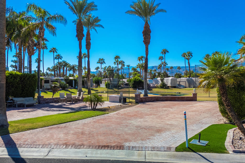 Seize the opportunity to own a gorgeous expanded golf course lot, perfectly situated on the coveted back 9. This south-facing property is an ideal canvas for enjoying the desert sun while soaking in fantastic mountain, golf course, and water views. Experience the ultimate convenience with a prime location near the vibrant El Saguaro Clubhouse, the pickleball pavilion, the golf starter shack, and a hub of resort activities. This lot provides the perfect foundation to design your dream Palm Springs retreat, blending stunning views with unbeatable accessibility.Outdoor Resorts Palm Springs is a Five Star RV Resort Community combining luxury with affordability. It is a guard gated resort that sits on 137 beautifully landscaped acres with 27 holes of executive golf, 10 tennis courts, 13 pickleball courts, 8 swimming pools, a fully equipped fitness center, espresso bar, sports bar, beauty salon/barber shop, full-service restaurant, convenience store, 2 club houses, activities, special events and so much more.