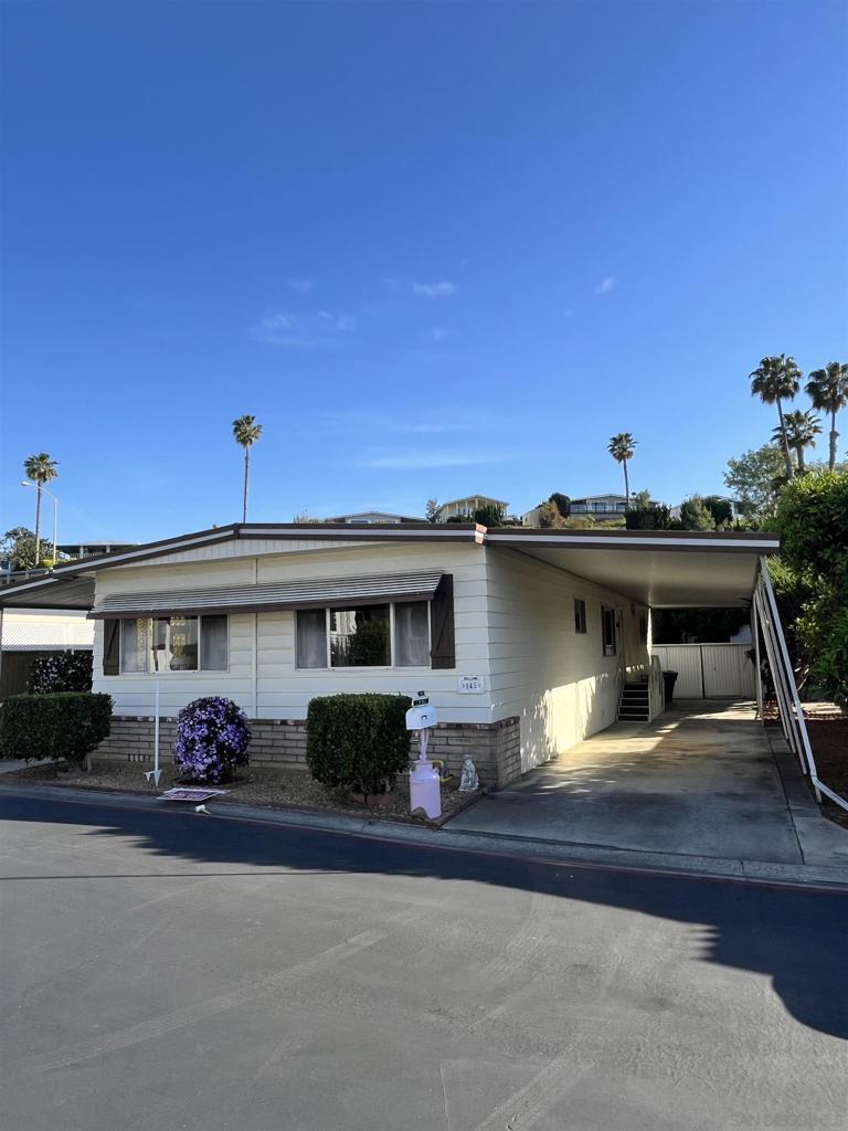 LAND OWNED opportunity with low HOA. #145...This wonderfully well maintained 1972 Citation model. Two room and two bathrooms, with an extensive California room. Has the coolest dining area, like a Perisian Coffee Shop. Very spacaious 1440 square feet. Lots of potential to put your personal touches on this home. Madrid Manor is a sought after 55+ Senior community with activities and ameneties to keep you busy.