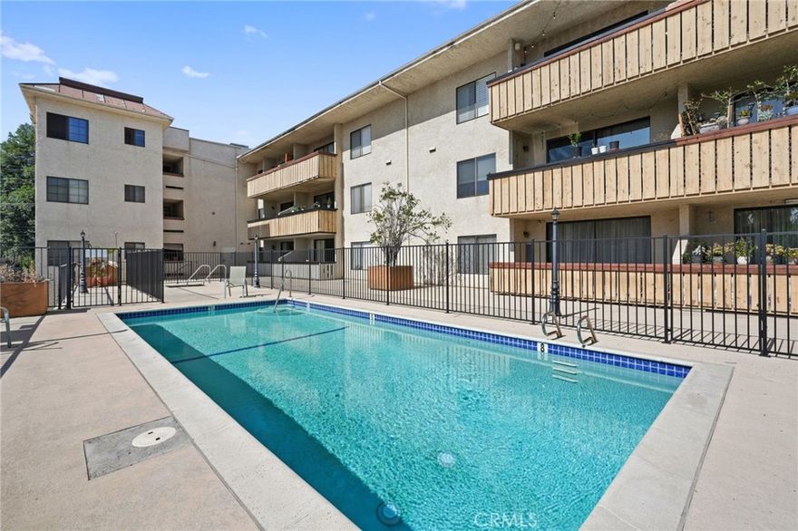Beautifully remodeled condominium in the highly desirable Nordhoff Terrace complex.  Features include 2 bedrooms and 2 updated baths, huge living room, updated chef's kitchen with quartz counters and stainless steel appliances, laminate flooring and recessed lighting throughout, large primary room offers a walk-in closet with custom built-ins and en-suite primary bath.  Step outside onto your covered patio with new tile floors where you can enjoy views of the community pool & spa.  Conveniently located just minutes to the Northridge Mall, Costco, CSUN and wide variety of dining and shopping options.  Additional amenities include a controlled entrance to the building, a convenient elevator, in-unit washer & dryer hook-ups and so much more.
