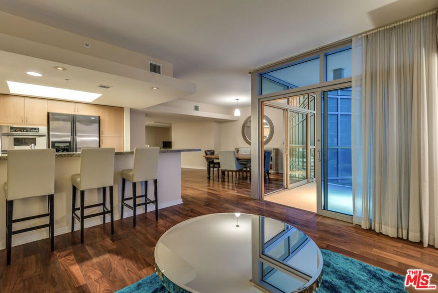 **Photos are of the same floorplan on a lower floor** Premier 2-bedroom, 2.5 bathroom + office Penthouse townhome in the, full-service Azzurra high-rise in Marina Del Rey. These highly coveted residences are extremely rare. Only eight 2-bedroom townhome units exist in the entire building. Perched on the 18th and 19th floors, this exceptional home offers stunning city and mountain views through floor-to-ceiling windows in every room, flooding the space with natural light and a sense of openness. Designed for modern luxury living, the spacious layout features nearly 10-foot ceilings, wood floors in the living areas, two private balconies, and dual entrances for added convenience and privacy. The open-concept living and dining areas flow seamlessly ideal for both entertaining.  The chef's kitchen is thoughtfully appointed with Quartz countertops, stainless steel appliances, a breakfast bar, and ample cabinetry blending function with style. Additional highlights include in-unit laundry, central air and heat, and two dedicated parking spaces. Rent include cable w/HD channels, internet, water, trash and an abundance of resort-style amenities -24 hour valet parking for guests, 24 hour front desk & security, concierge, rooftop spa & sky-lounge w/panoramic views, outdoor kitchen with BBQ's, sparkling heated pool & spa, business center, media lounge, fine art collection, indoor/outdoor professional fitness center w/yoga/pilates training studio, & more. Just seconds from world famous beaches, Marina access, LAX, parks, bike path, dog walk, Abbott Kinney, shops/restaurants & dine-in movie theater and much more!