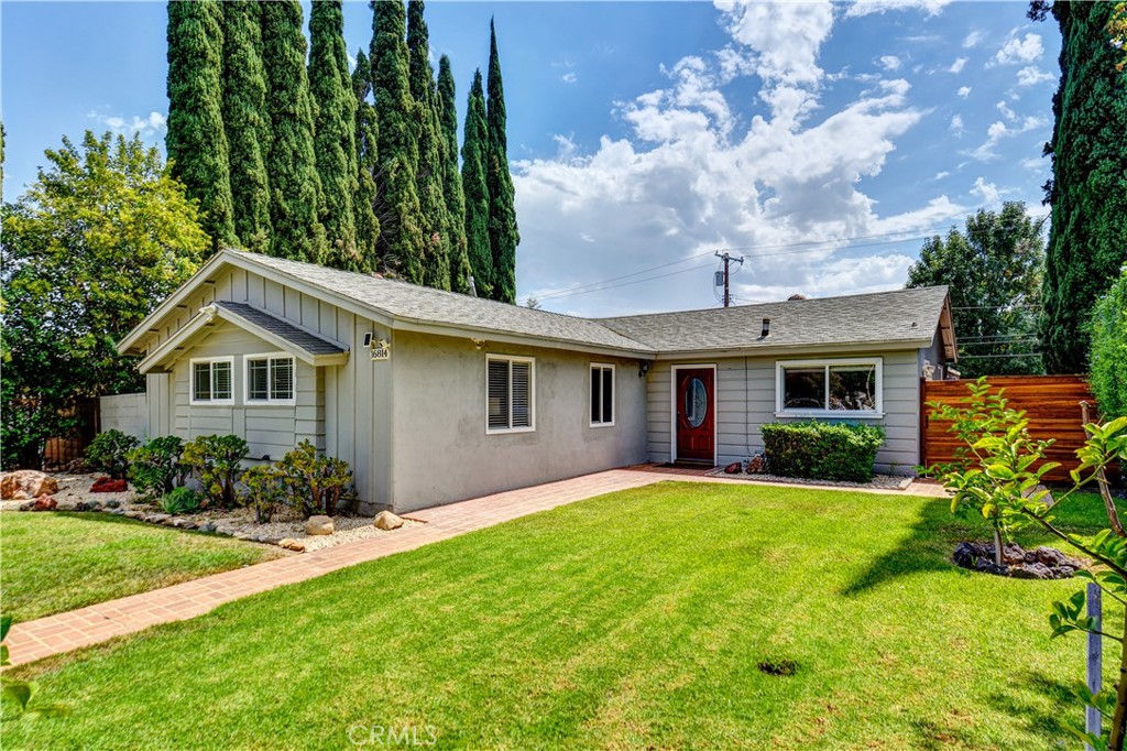 Welcome to this beautifully updated home offering modern comfort and convenience in a prime location, with 4 bedrooms, and 2 bathrooms. Home has extra 5TH bedroom next to the dining area.
The kitchen was tastefully upgraded in 2019 with a striking backsplash, wine cooler refrigerator, barn sink, and kitchen appliances (refrigerator, stove, micro wave, and dishwasher), making it a true chef’s delight. The spacious living room features a built-in surround sound system and recessed lighting. Hardwood floors throughout the house.
Step outside to enjoy the hardwood deck made with REDWOOD. Enjoy your evenings with a built-in barbecue, and plenty of space for entertaining. Solar panels provide energy efficiency, while lush fruit trees—limes, lemons, grapefruit, and oranges—create a private orchard atmosphere.
Additional highlights include: inside laundry.
This home is perfect for those seeking comfort, convenience, and California living at its finest!