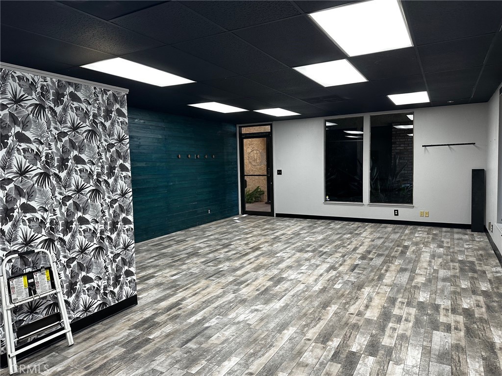 This suite was previously a salon, but could be used as general office as well. The unit has natural light with multiple windows, luxury vinyl flooring, sink, and an accent wall that gives it a modern look. The complex has ample parking and is in a central location close to freeway access.
