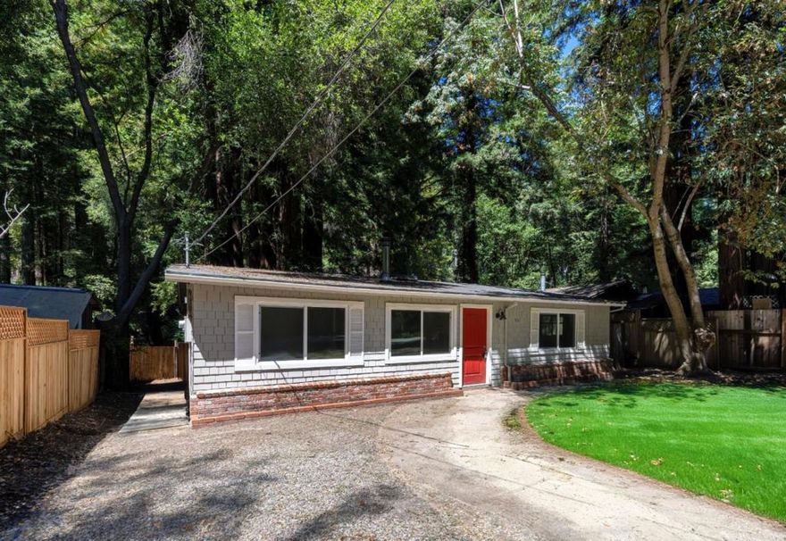 Welcome to your serene single story retreat at 152 Lorenzo Ln, nestled in the SantaCruz Mountains along the San Lorenzo River. This charming 2bed, 1bath home features a flat driveway and easy walkup entry with level access throughout. Inside, enjoy open living areas, a well appointed kitchen, and cozy bedrooms. Step outside to your private riverside yard perfect for listening to the gentle river flow, relaxing, or dining al fresco. With public utilities and high speed internet, this peaceful sanctuary is ideal for streaming, remote work, or a dedicated home office. Adventure awaits nearby - hike among ancient redwoods at Henry Cowell Redwoods State Park, fish in the river, or zip-line through the canopy at Mount Hermon Adventures. Downtown Boulder Creek offers delightful dining options: enjoy Italian in a historic red wood lined dining room at Scopazzis, casual Mexican at Taqueria Los Amigos, or pub-style fare and brews across the street at Sawmill. Minutes from Highway 9 and downtown Boulder Creek, and just 40 minutes to Campbell, this home is a perfect blend of rustic charm, modern ease, and access to outdoor fun.
