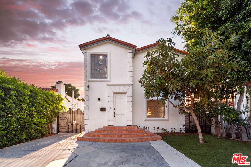 Welcome to this warm and spacious 5-bedroom home in one of Beverly Hills' most family-friendly neighborhoods. Perfectly positioned just steps from shops, restaurants, and houses of worship, the location offers both convenience and a true sense of community.Inside, a bright two-story entry welcomes you into a home designed for comfort and connection. The living room, with its large picture windows and neighborhood views, opens seamlessly to the dining area, kitchen, and cozy breakfast nookideal for family meals and everyday gatherings.  The thoughtful floor plan provides three bedrooms and two bathrooms upstairs, creating a private retreat for family members, while the main level offers two additional bedrooms and a full bathperfect for guests, in-laws, or a playroom.  A laundry room conveniently located off the kitchen makes daily routines easy.  Step outside to enjoy a generous backyard with space to play, entertain, or simply relax.  The lush garden with fruit trees brings nature right to your door, while the converted garage offers a versatile gym, play space, or hobby room.