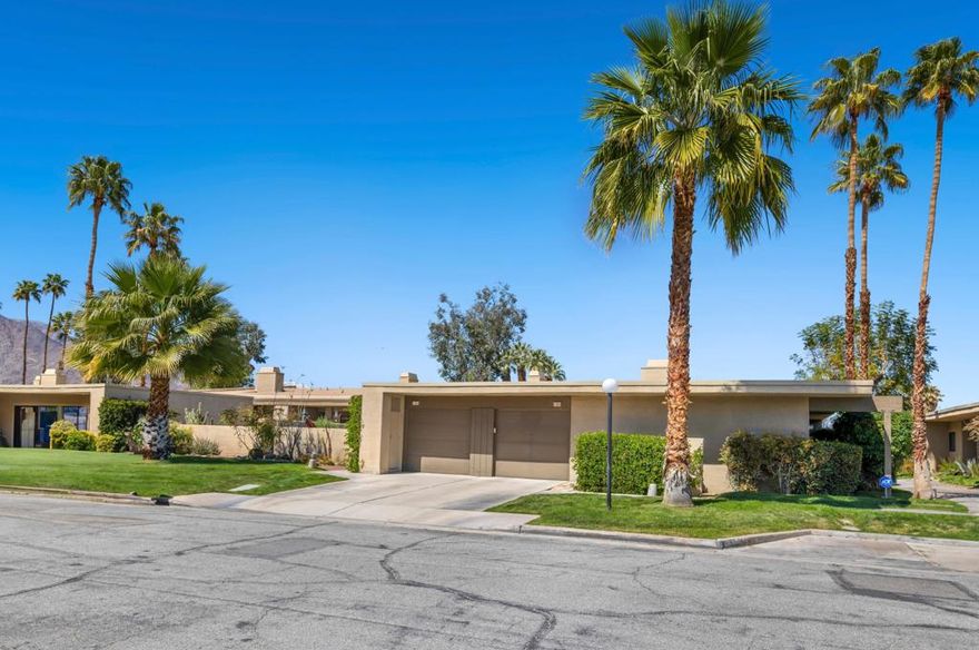 RECUCED PRICE.  Best deal in the Rose Garden.  Classic Mid-Century Wexler Design. Three-bedroom, two-bath for $669,000. Step into timeless Palm Springs living with this iconic Donald Wexler-designed three-bedroom bungalow in the highly sought-after Rose Garden complex--just blocks from downtown. This ground-level home welcomes you with an enclosed atrium featuring new wood deck flooring, abundant natural light, and newer double-pane sliders and windows.  Inside, enjoy a designer kitchen with wood cabinetry, granite countertops, and new appliances. Tile flooring flows throughout, complemented by vaulted ceilings in the living room and a large slider framing stunning mountain views. The rare, oversized backyard patio extends the living space and is fully enclosed, making it perfect for pets and private outdoor entertaining.The spacious primary suite is joined by two additional bedrooms and updated baths, with only two shared walls for added privacy. A one-car garage includes a newer furnace, AC, and water heater.  The Rose Garden offers manicured grounds, two pools, three spas, and a vibrant pickleball scene with four dedicated courts, plus tennis and mixed-use courts. Located near shopping, dining, groceries, coffee shops, the Mizell Senior Center, and parks--this central location is unbeatable. This home is an exceptional value compared to nearby complexes--great Wexler-designed gem at a compelling price.  Whether you're seeking a full-time residence or a seasonal retreat, this property offers the perfect blend of style, comfort, and community.  The home interior  is currently being painted.