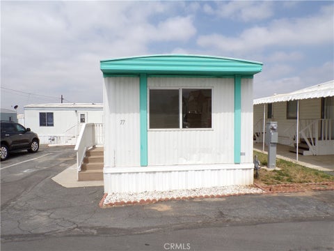 Photo of 12710 3rd Street St #77, Yucaipa, CA 92399 (MLS # OC26175922)