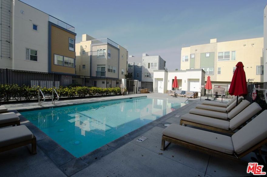 Exclusive Gated townhome in Silverlake.  2016 built, 2 bed 2.5bath home at the Latitudes at Silverlake has a modern kitchen with Viking appliances and large prep / dining island.  Bathrooms consists of modern updates.   Living and bedrooms are surrounded with large windows to bring lots of natural light.  Both bedrooms have en-suite baths and the primary bedroom has a walk-in closet.  Separate powder room for guests at the main level.   In unit laundry, central heat & air and 2 car private garage is EV charger ready.  Community amenities includes guest parking spaces, landscaped grounds and a sparkling pool with spa. Desirable Ivanhoe Elementary School, Restaurants / nightlife, Trader Joe's, Whole Foods and Silverlake reservoir nearby.   Don't miss this lease opportunity in Silverlake and nearby Atwater Village