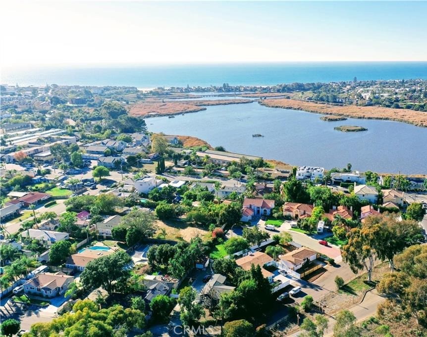 Fabolous home with newer ADU West of the 5 freeway! Has a great beachy vibe ready to just relax and bike,walk to the lagoon, beach and Carlsbad Village. The Coaster/Amtrak to go to baseball games or football games are just a walk away. Blocks away from award winning schools. The house has a very secluded feel giving you great privacy. Private gate opens up to expansive parking. The backyard is very nice for BBQ's. The main single story house has 3 bedrooms 2 bathrooms. Master bathroom has double vanity. The ADU has a nice size living area with full bathroom and kitchen and it's own entrance and address. No HOA nor Mello Roos. This is a must see property! Great rental income.