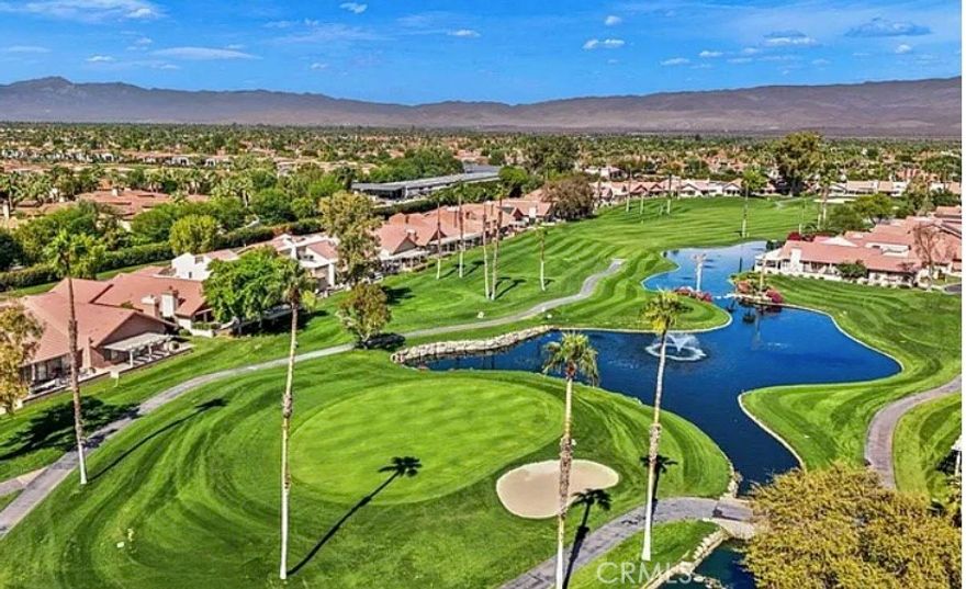 Welcome to one of the finest golf course homes in The Oasis Country Club. This beautifully upgraded 2-bedroom plus an office, 2-bath residence offers an open floor plan filled with abundant natural light, ideal for both everyday living and entertaining. French doors throughout the home enhance the flow, while laminate flooring and a neutral paint palette create a warm, inviting atmosphere.

The kitchen is thoughtfully designed with granite countertops, upgraded cabinetry, designer light fixtures, and a distinctive copper tiled ceiling that adds character and charm. Both bathrooms have been remodeled with modern finishes and glass shower enclosures. Additional features include plantation shutters, mirrored closet doors, and ceiling fans in all bedrooms.

The spacious primary suite includes a private retreat, with an office conveniently located just outside the primary bedroom—perfect for working from home or enjoying a quiet reading space. Outdoor living is a highlight, featuring pavers in the front patio and a large rear patio ideal for entertaining or relaxing while enjoying the golf course setting.

Just across the street, enjoy easy access to one of the community’s 18 sparkling pools and spas, while a short stroll brings you to the clubhouse offering casual and formal dining, a library, and a fully equipped fitness center. The Oasis lifestyle is second to none, featuring three lighted tennis courts, an 18-hole executive golf course, pickle ball courts, and a dedicated 18-hole putting course. Located in a vibrant, all-ages vacation community near world-class dining, shopping, recreation, and entertainment, this Palm Desert home offers the perfect blend of comfort, convenience, and resort-style living. Come discover The Oasis—you’ll be glad you did.