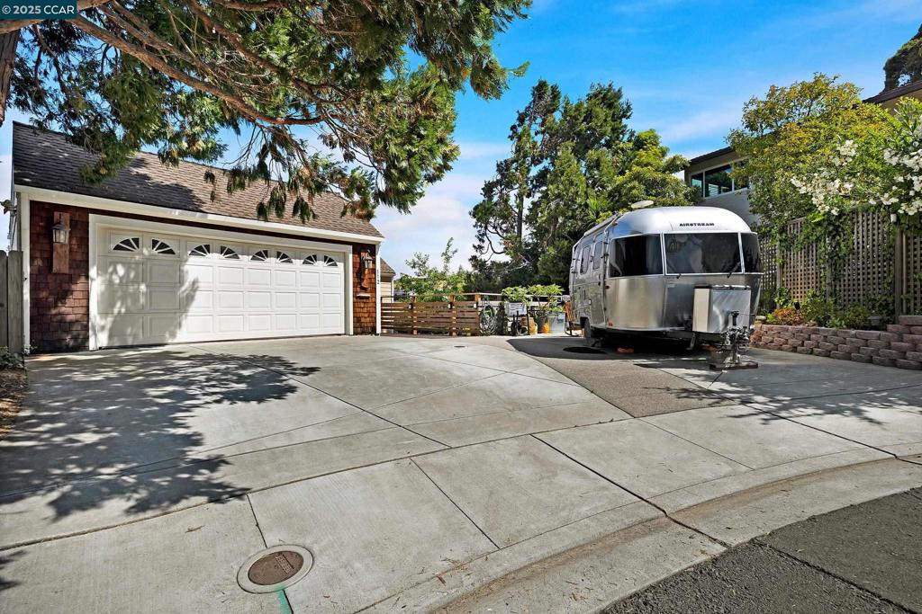 Nestled in the desirable Southampton Hills of Benicia on a peaceful cul-de-sac, this one-of-a-kind retreat showcases sweeping views of rolling hills, the water, and the Carquinez Bridge through picture windows and from multiple decks. The sunsets are amazing! The customized floor plan features 3 bedrooms, 2 baths, vaulted ceilings, skylights, and a versatile bonus room, while the oversized laundry room provides abundant storage and flexible space for a home office, fitness area, or hobby space. Outdoors, enjoy serene gardens, expansive decks, and room to entertain or simply unwind, with expanded parking complementing the two-car garage for added convenience. Enjoy access to the nearby swim club to add to your lifestyle. Living in Benicia offers endless opportunities to enjoy restaurants, charming cafes, and top-rated schools, as well as waterfront adventures such as sailing, kayaking, stand-up paddleboarding, and windsurfing along the scenic Carquinez Strait and Benicia Marina. A great commuter location with easy access to Hwy 780, connecting quickly to both 680 and 80, makes transportation throughout the Bay Area simple and convenient.