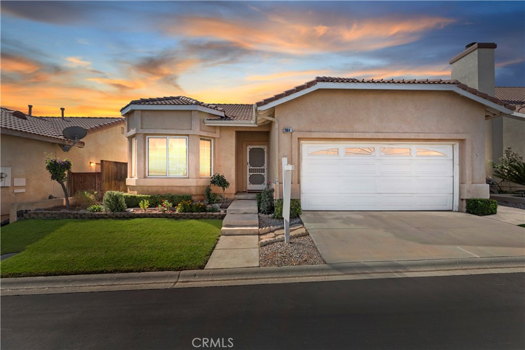 Charming 55+ Community Home in Serrano Del Vista- The ideal retreat awaits you! Discover your perfect home in the heart of the highly sought after Serrano Del Vista gated community. This delightful home offers the comfort and convenience you've been looking for with a low maintenance lifestyle designed for active adults 55 and over. Features of this home include newer carpet and interior paint making it move-in ready. Covered concrete patio: Ideal for relaxing or entertaining guests, offering year round enjoyment. Spacious Interior: Light filled living spaces that create a welcoming atmosphere for family and friends. Community Amenities include access controlled gate for your security. Recreation Room: A hub for social gatherings, perfect for meeting neighbors or enjoying leisure time. Tennis, Pool and Spa: Stay active and unwind with access to tennis courts, a sparkling pool and a rejuvenating spa. Gym: Stay fit and healthy with the onsite fitness center. Engaging Activities: From fitness classes to game nights, poker tournaments and more. There's always something fun to do! Low HOA Dues: Enjoy all these incredible amenities at a fraction of the cost compared to other 55+ communities.