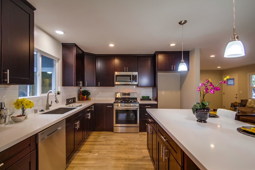 REALLY PRETTY!! Remodeled La Mesa Beauty. Everything you could ask for. Large open entertainers kitchen with new cabinets, quartz counters, tiled backsplash, stainless steel appliances.... New roof, new panel and upgraded electrical, large "secret garden" backyard with mountain views, automated sprinklers and drip line system. Attached 2 car garage, large laundry room, oversized master with walk in closet. New dual pane windows and ceiling fans throughout. So much more. MUST SEE!! Neighborhoods: Fletcher Hills Equipment: Garage Door Opener, Range/Oven Other Fees: 0 Sewer: Sewer Connected Topography: LL