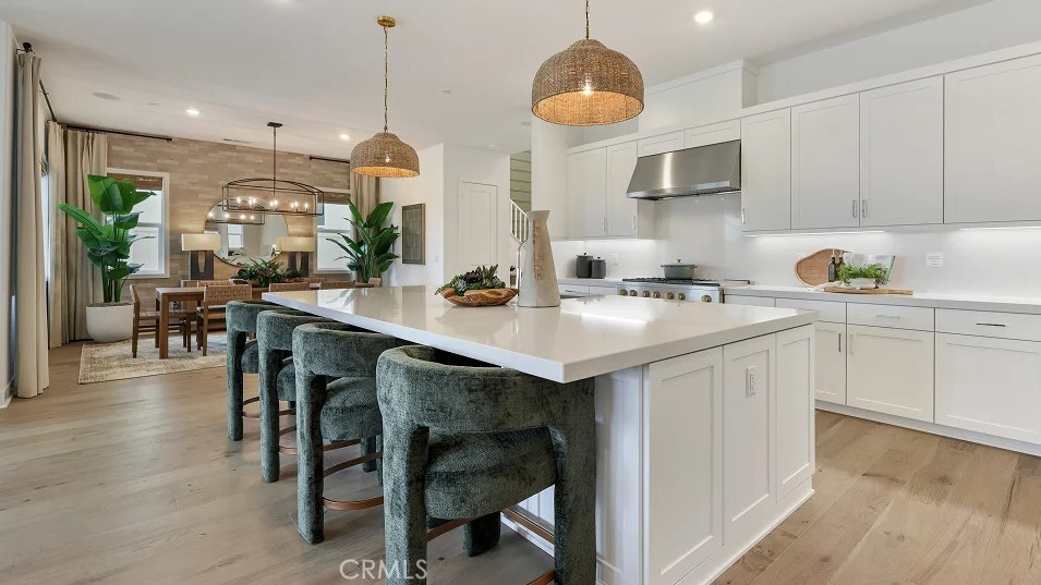 This expansive two-story home offers plenty of space with a total of 4 bedrooms with one of the bedrooms located downstairs with its own private bathroom. The first floor also offers a Den perfect for an office or gaming room. The rest of the first floor features an open layout from the modern kitchen that offers white cabinetry throughout, massive walk in pantry. The dining and family room opens to a covered California Room ideal for indoor-outdoor living. The second floor hosts a bonus room along with three more bedrooms all have their own private bathroom. The luxe owner's suite a retreat with a large walk in closet.