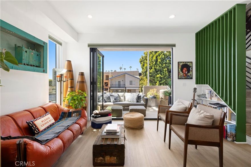 Live in the heart of Hollywood now in this four level townhouse corner unit with three exposures for epic quality of life + light! This turnkey new construction boasts of three pristine bedrooms with en-suite bathrooms with custom closets, shades, and a gorgeous floor plan. Each vertical provides opportunity to live/work/entertain on the highest level: rooftop terrace with epic view of the HOLLYWOOD sign is the ideal after hours hang. Two car garage, powder room, media closet, appliance depot in kitchen with extra outlets in prime location close to Paramount Pictures, Netflix Headquarters, and Raleigh Studios. Sunset Magazine says, "This is L.A.'s Hottest Neighborhood Right Now." This sumptuous spot, intersected by Melrose, is why Eater wrote, "How Melrose Hill Became LA’s Hottest Culinary Boom Town." Shop at Pop Up Home, have a splash at Bar Etoile, and explore global gallerist David Zwirner just steps away. Near Metro, Cinespia at Hollywood Forever, and Larchmont Village Farmers Market; Hancock Park adjacent. Calling all culture vultures - this is your sign to move into this luxury loft like single family with the coolest community. Also offered for sale at only: $1,300,000.