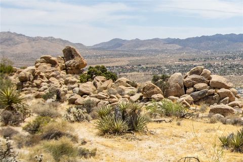 Photo of 57333 Buena Suerte Road, Yucca Valley, CA 92284 (MLS # JT25127519)