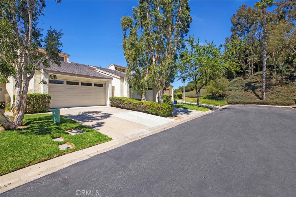 Large Remodeled and Freshly Painted 2 Bedroom + LARGER LOFT with Great Privacy and Spectacular Hills and Sunset Views! Located in the Private Gated Community of Park Niguel. Highly Upgraded Gourmet Kitchen with ALL High-End Appliances and Granite Countertops. Travertine Tile and Engineered Wood Flooring Throughout the home -- Easy Clean Flooring with NO carpet. Upstairs is the Primary and Secondary Bedrooms with Plenty of Closet Space and Both Bedrooms Lead out to a Larger Private Balcony with Peaceful Hill and Sunset Views overlooking Crown Valley Park. All 3 Bathrooms have been Remodeled. High Quality Plantation Shutters throughout the home. Quiet, Restful Larger Enclosed Backyard with a New Covered Patio and Pavers and Wonderful Panoramic Views. 2 Car Direct Access Garage Plus a Full Size Driveway with Additional Parking for 2 Cars. Private Location at the End of the Cul-de-Sac with the Community Pool and Spa a Short Walk. Walk to Crown Valley Park, with a Olympic Size Pool, YMCA, Summer Concerts, Amphitheater, Community Center, and Botanical Gardens. Laguna Niguel Regional Park is also a Short Walk with Lake Fishing, Playground, Picnicking, Birdwatching, Tennis, Pickleball, and Volleyball Courts. Many Walking/Jogging and Bike Trails surround the home. Close Proximity to Pristine Beaches, Award-Winning Schools, and Renowned Dining Experiences. Southern California living at its Best!