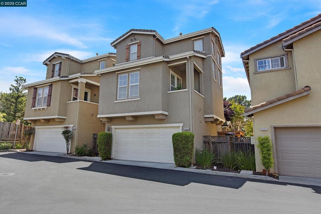 Welcome to your dream home! This charming three-story, three-bedroom, and three-and-a-half-bathroom residence is located in the serene Bay Villas community, just steps from the beautiful Richmond Country Club and San Pablo Bay/Point Pinole State Park. The inviting first floor features a cozy bedroom with an attached bathroom and a convenient laundry room. On the second floor, the gourmet kitchen comes with a lovely balcony, while the spacious dining and family room boasts a warm fireplace for memorable gatherings. The third floor is home to a luxurious master suite and a delightful junior suite, creating a perfect retreat for everyone. With easy access to Richmond Parkway, I-80, and I-580, along with nearby shopping, dining, and public transportation, this home offers a wonderful lifestyle just waiting for you to embrace. Welcome home!