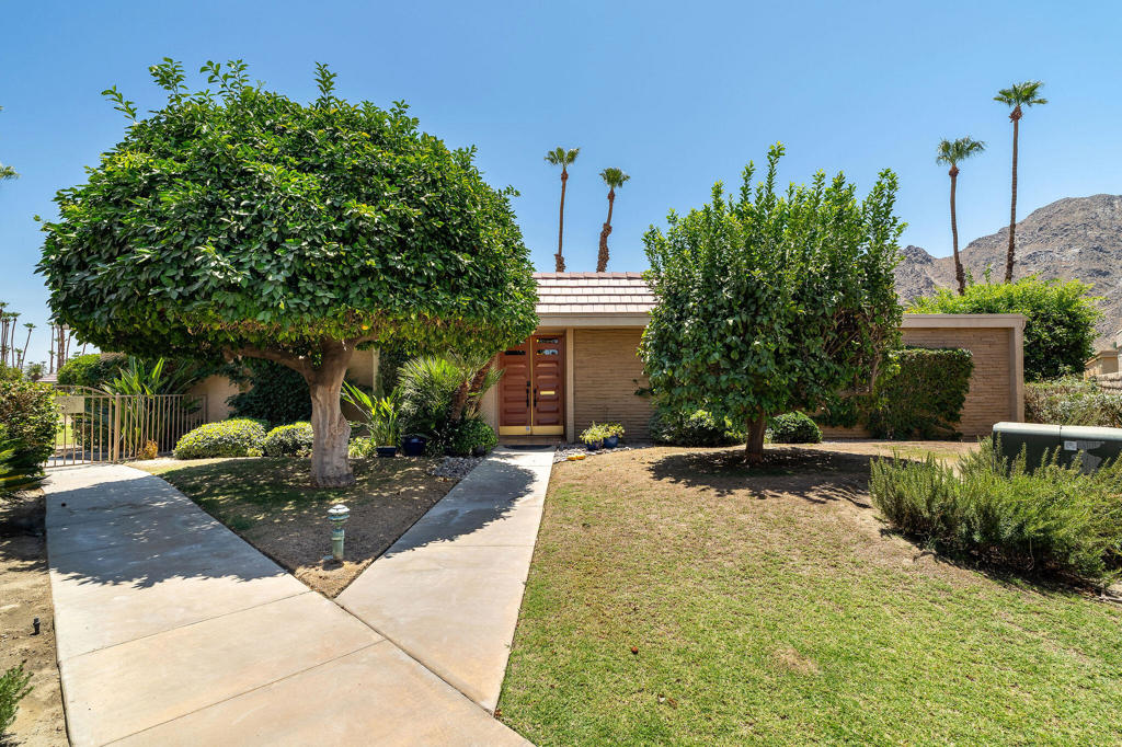 Beautiful Southwestern style 2 bedroom condo in the Indian Wells Country Club. Saltillo tile floors throughout the interior and on both patios. Granite or Saltillo tile countertops throughout. New electric panel inside and out. New AC condenser and capacitator. Louvred Shutters and fans throughout. Ample storage shelving in the garage. Live in prestigious Indian Wells and take advantage of resident perks from the city with discounted (approx. $55. golf) on both Championship Golf courses and discounts at the restaurants OR become a social or golf member of the Indian Wells Country Club with two clubhouses and two golf courses. It's called the ''Fun Club of the Desert.'' Put this wonderful condo on your Must See List!!!