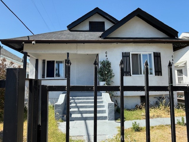 Move in ready, 2 on a lot features 3 bedroom's 2 full baths 2nd unit is 2 bedroom's 2 full baths. Beautiful kitchen with granite counter tops, updated bathrooms, tile flooring in the kitchen the living area and bathrooms. Great home for 1st time buyers live in 1 and rent the other for passive income. Close to freeways, schools and shopping centers. A must see home.